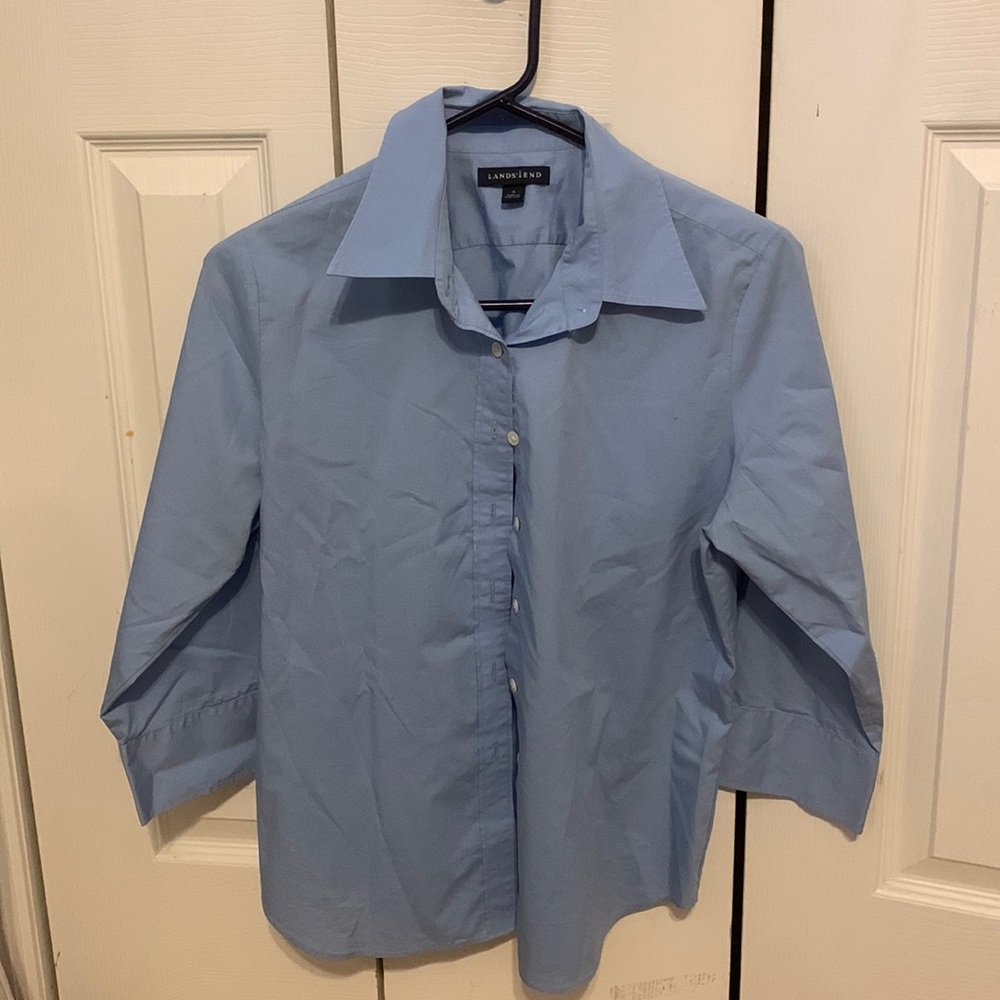Light blue long sleeve button down top